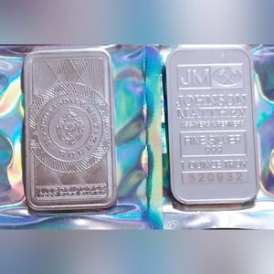 Lot Of Two One Ounce Silver Bars 1 Jm Matthey And 1 Scottsdale Marquee Peacock